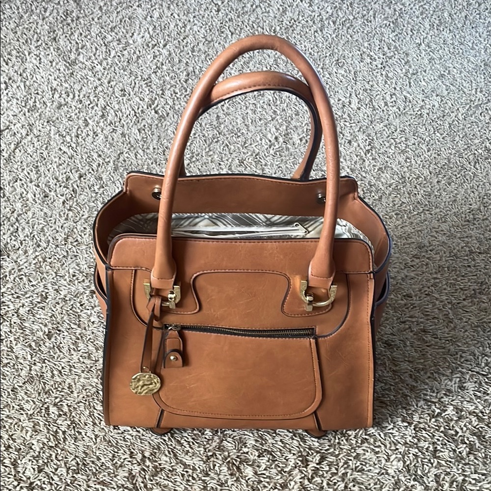 London Fog magnetic top closure bag